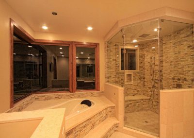 A travertine heavy bathroom with a modern contemporary style in a Redlands home